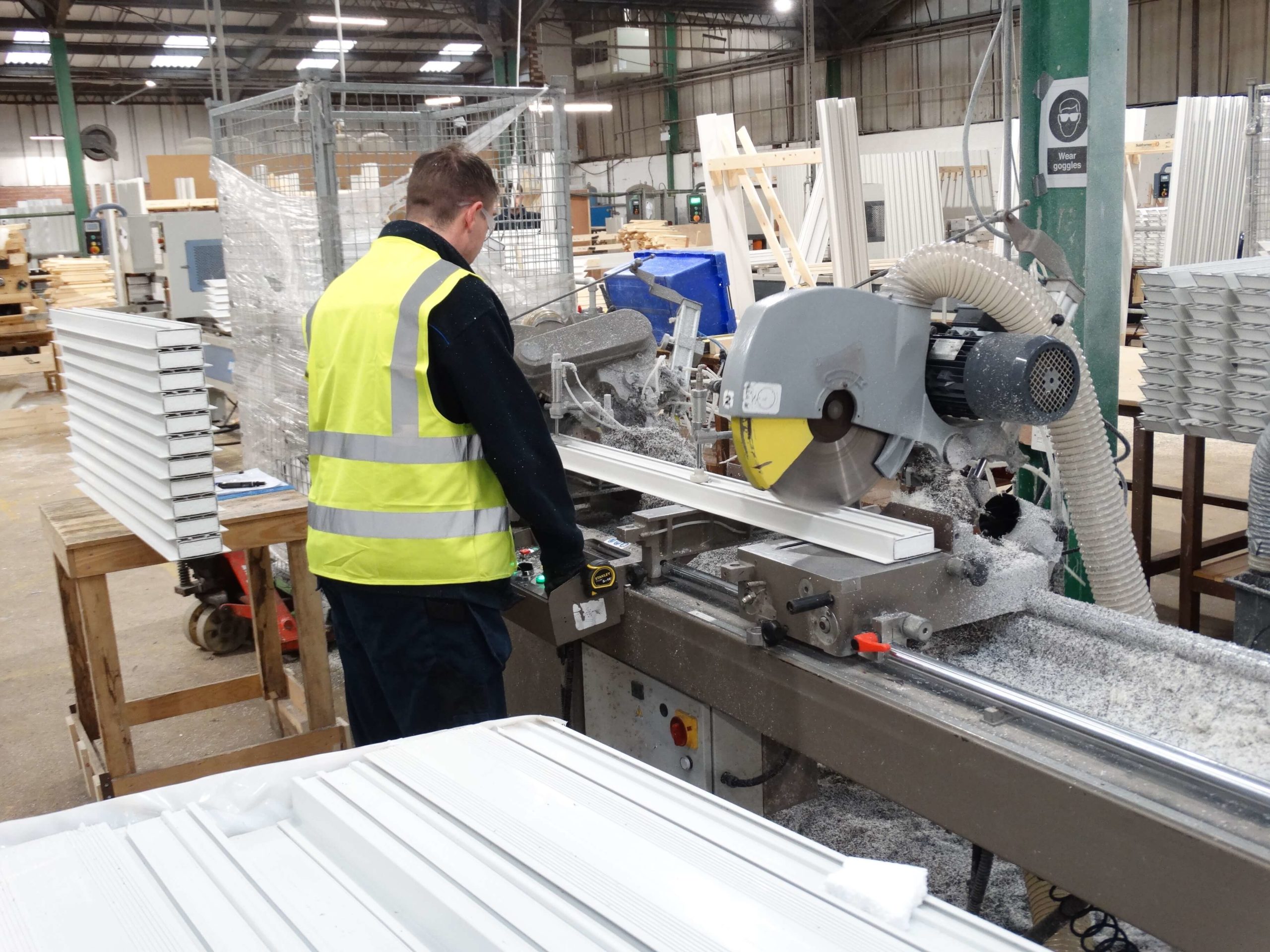 Man working in a factory that manufactures cavity closers